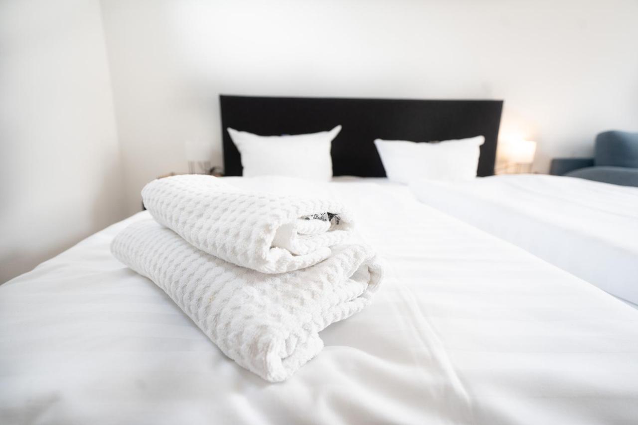 Hotel Zur Alten Stadtkellerei 莱比锡 外观 照片 A bed with a duvet