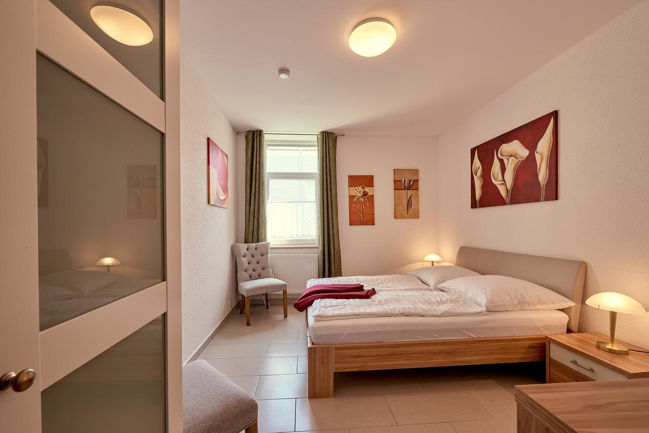 Hotel Zur Alten Stadtkellerei 莱比锡 外观 照片 A bedroom